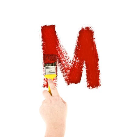 Painting Letter M on white backgroundの写真素材