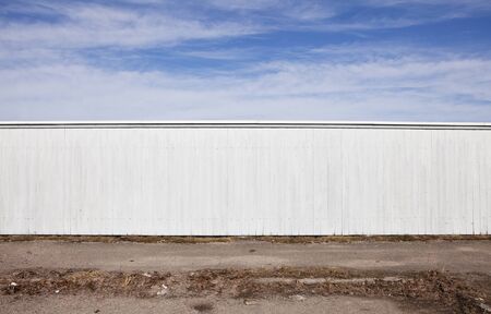 White Fence and blue skyの写真素材