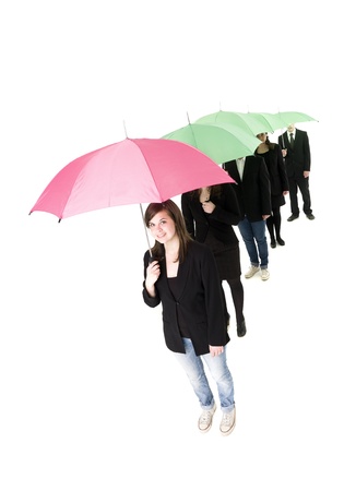 Group of people with umbrellas isolated on white backgroundの写真素材