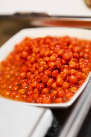 Close up of a plate with rowanberries