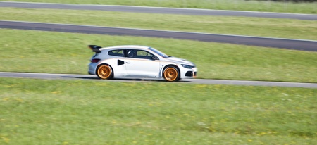 Racing car in action on a summer day