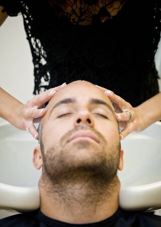 Washing hair at the Beauty shopの写真素材