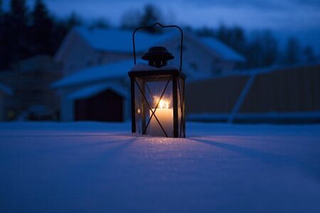 Lantern in the dark winterの写真素材