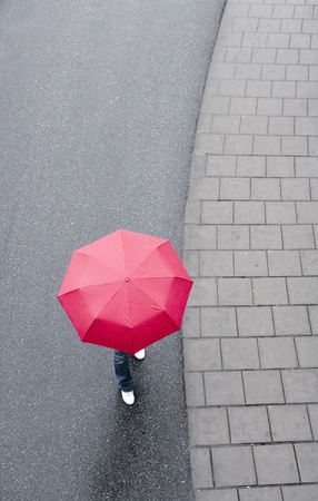 Human with red umbrella from hig Angle viewの写真素材