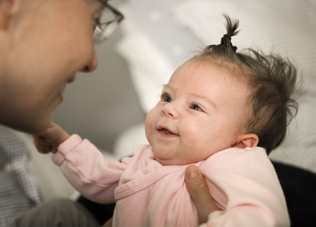 Baby Girl with her motherの写真素材