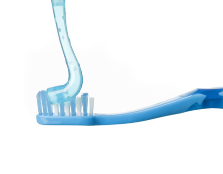 Blue toothbrush isolated on white backgroundの写真素材