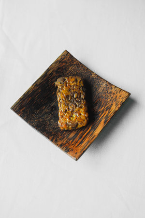 Tempe is a traditional food from Indonesia on the plate on top view