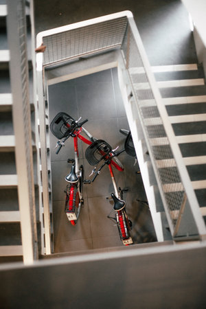 Group of bikes in parking in the hotel lobby. Top viewの写真素材