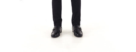 Close-up of side view business man elegant shoes posing relaxed isolated on white background and able to add some textの写真素材