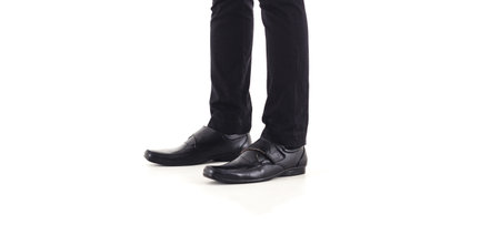 Close-up of side view business man elegant shoes posing relaxed isolated on white background and able to add some textの写真素材