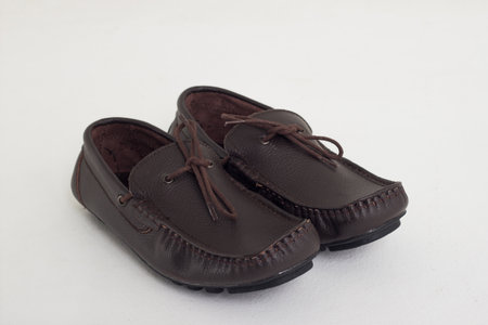 Brown leather shoes on a white background. Isolated.の写真素材