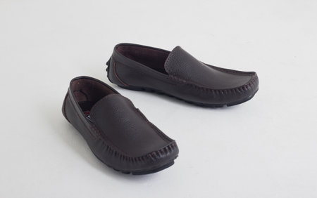 shoes for a young man, for daily use on a white backgroundの写真素材