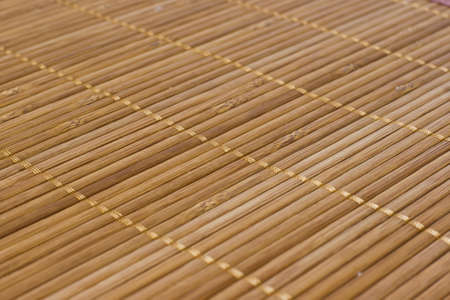 Background bamboo sticks with thread unitingの写真素材