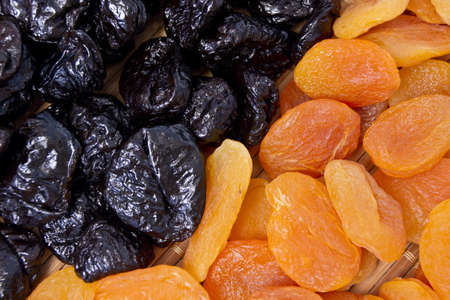 Background from a dried apricots and prunesの写真素材