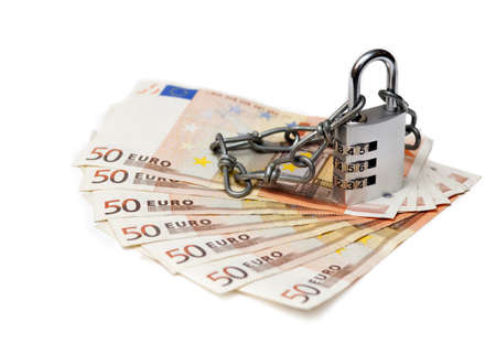 Combination lock and euro on white backgroundの写真素材