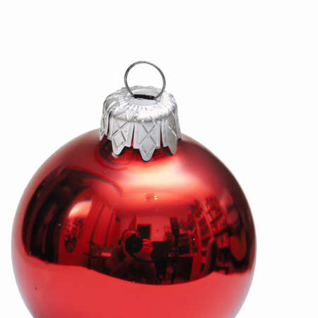 Christmas tree ball with Silvester paparazzi isolated on the white backgroundの写真素材