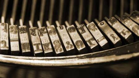 A closeup of an old typewriter keys