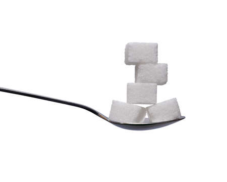 Teaspoon with sugar cubes on white backgroundの写真素材