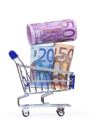 shopping cart with euro banknotes on white background の写真素材