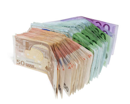 Pile of euro banknotes money on a white backgroundの写真素材