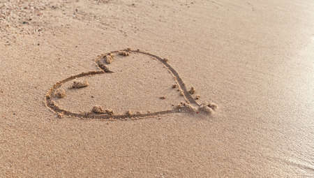 Heart on the sand beachの写真素材