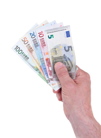 Hand holding Euro money fan with different billsの写真素材