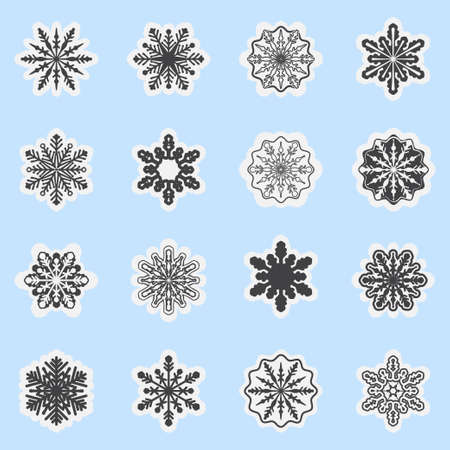 A set of vector snowflakes. Christmas snowflakes isolated on a blue background. Collection of New Year's design.のイラスト素材