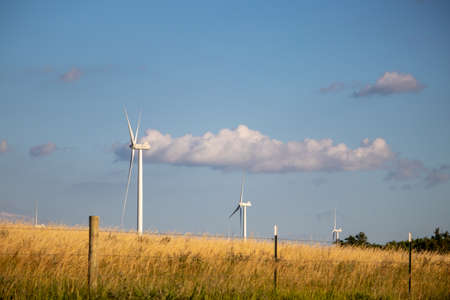 ONeill, Nebraska, US July 22, 2019 Wind Farm In Nebraska Farm Land Wind Power Turbine Up Close. Wind turbines across Nebraska farm landsの写真素材