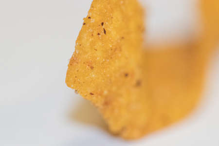 Close up of curly Frito corn chip. High quality photo
