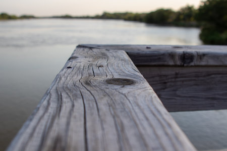 Wood bridge rail over river close up old . High quality photoの写真素材