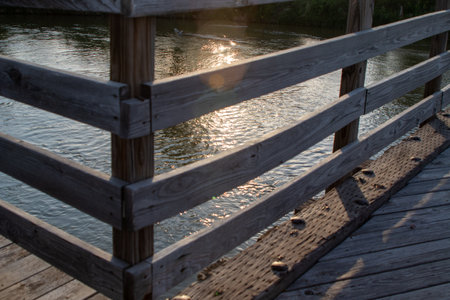 Wood bridge rail over river close up old . High quality photoの写真素材