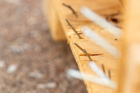 close up view of nails sticking out of a broken Crate. High quality photoの写真素材
