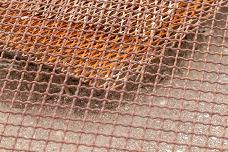 Iron Mesh grading rustic background outside rusty . High quality photoの写真素材
