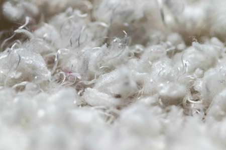 Background White Fuzzy Fluffy cotton scarf close up . High quality photoの写真素材