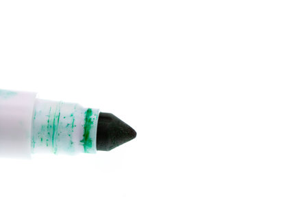 Close up on tip of Green marker white background . High quality photoの写真素材