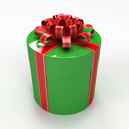 Green cylindrical gift box with red ribbonの写真素材
