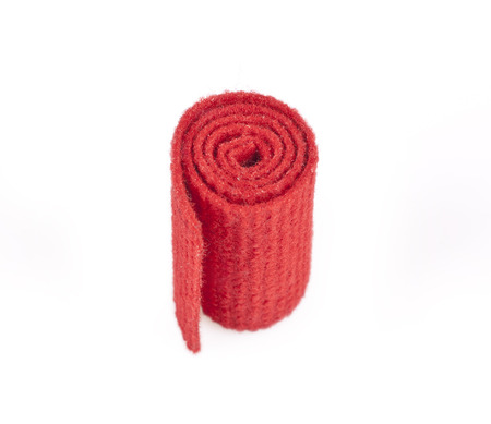 Red carpet roll on a white backgroundの写真素材