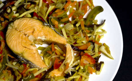 Close up of salmon with mixed vegetablesの写真素材