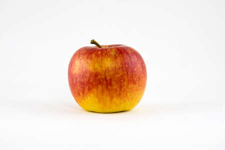 single ripe apple isolated on a white appleの写真素材