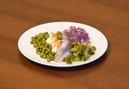 herring in oils with vegetablesの写真素材
