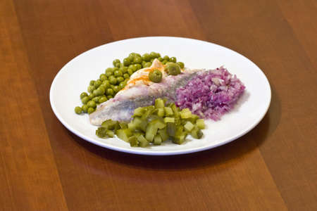 herring in oils with vegetablesの写真素材