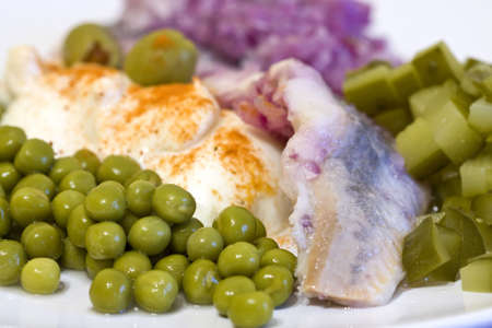 herring in oils with vegetablesの写真素材