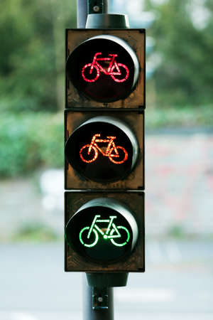 red, orange and green colour at raffic sign - bicycle roadの写真素材