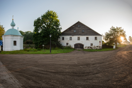The morning rays of the sun illuminate the old stables of the monastery. Valaam is a cozy and quiet piece of land, the rocky shores of which rise above the lush waters of lake Ladogaの写真素材