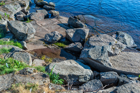 The shore and the bottom of Lake Valaam is formed from rock. The wonderful island Valaam is located on Lake Lodozhskoye, Karelia. Balaam - a step to heavenの写真素材