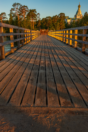 Bridge to the gates of St. Nicholas Skete. The wonderful island Valaam is located on Lake Lodozhskoye, Karelia. Balaam - a step to heavenの写真素材