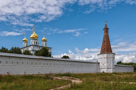 Cathedral with domes, a watchtower and fortified walls of the monastery.