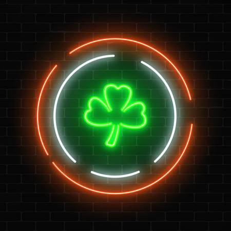 Neon glowing clover leaf sign on a dark brick wall background. Green shamrock as Irish national holiday symbol in circle frames. Vector illustration.のイラスト素材