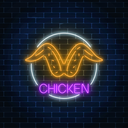 Neon glowing sign of chicken wings in circle frame on a dark brick wall background. Fastfood light billboard symbol. Cafe menu item. Vector illustration.のイラスト素材