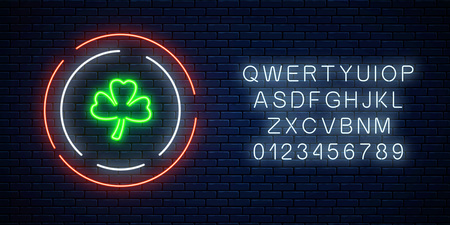Neon glowing clover leaf sign with alphabet on a dark brick wall background. Green shamrock as Irish national holiday symbol in circle frames. Vector illustration.のイラスト素材
